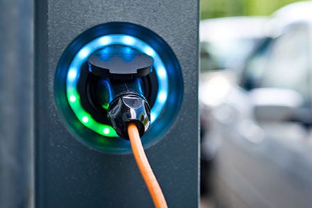National Grid predicts electric cars could form battery hubs to store renewable energy, The Guardian reports